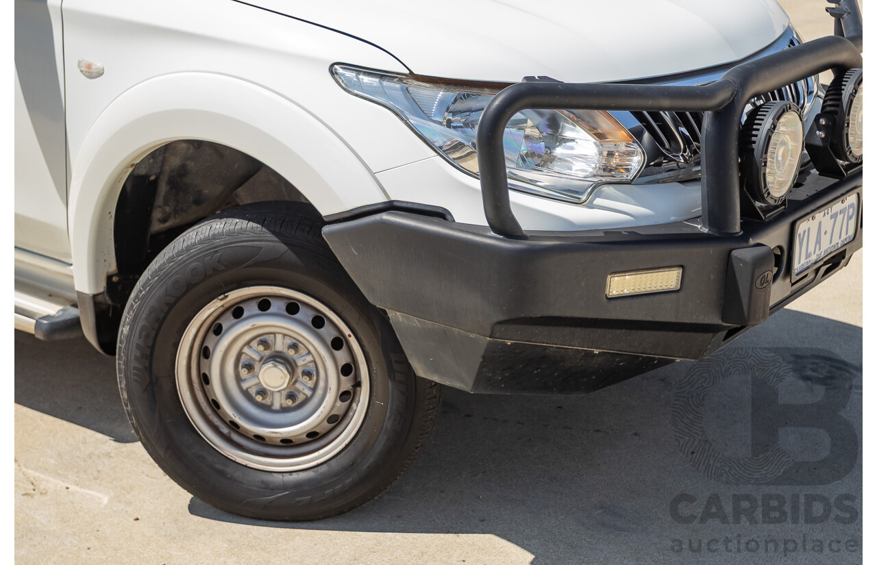 10/2016 Mitsubishi Triton GLX (4x4) MQ MY16 Dual Cab Utility Solid White Turbo Diesel 2.4L