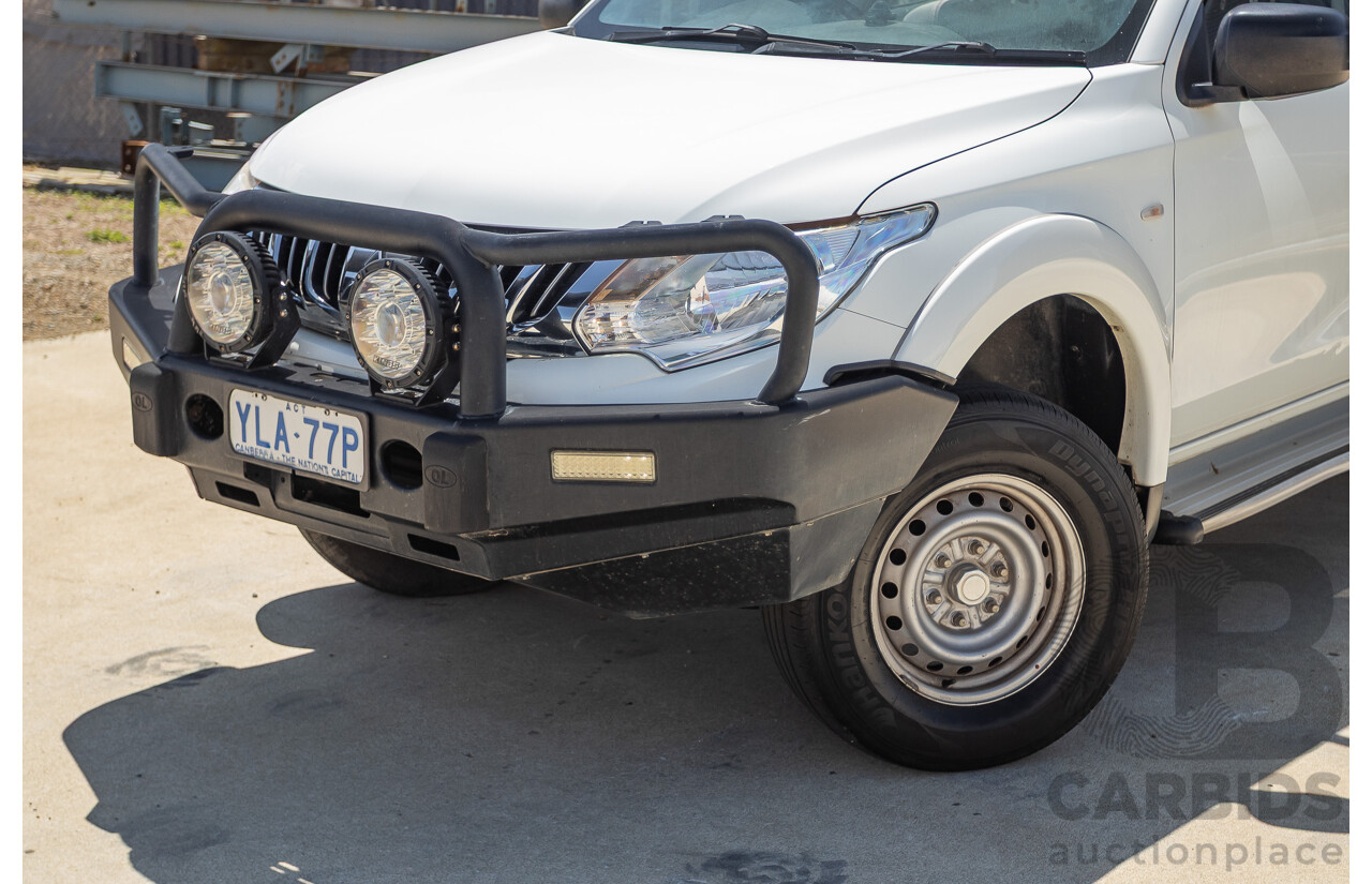 10/2016 Mitsubishi Triton GLX (4x4) MQ MY16 Dual Cab Utility Solid White Turbo Diesel 2.4L