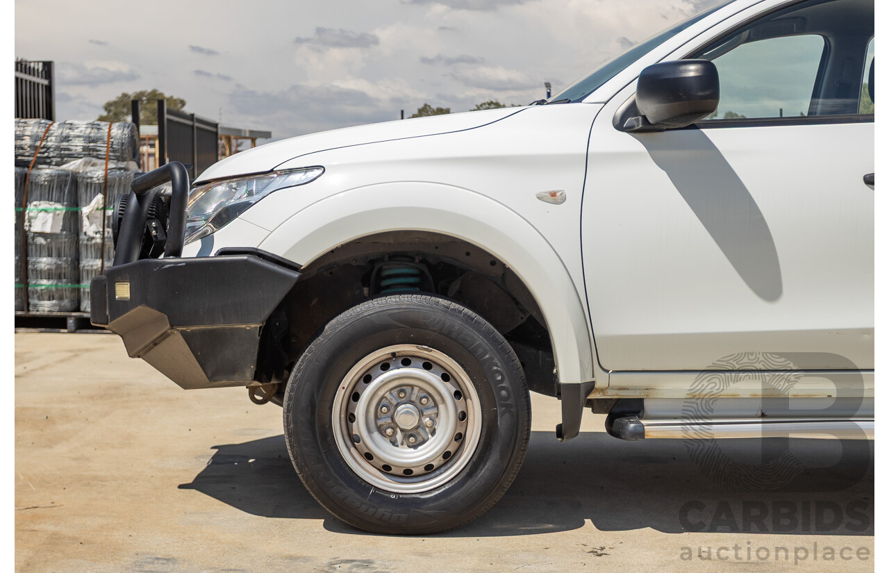 10/2016 Mitsubishi Triton GLX (4x4) MQ MY16 Dual Cab Utility Solid White Turbo Diesel 2.4L