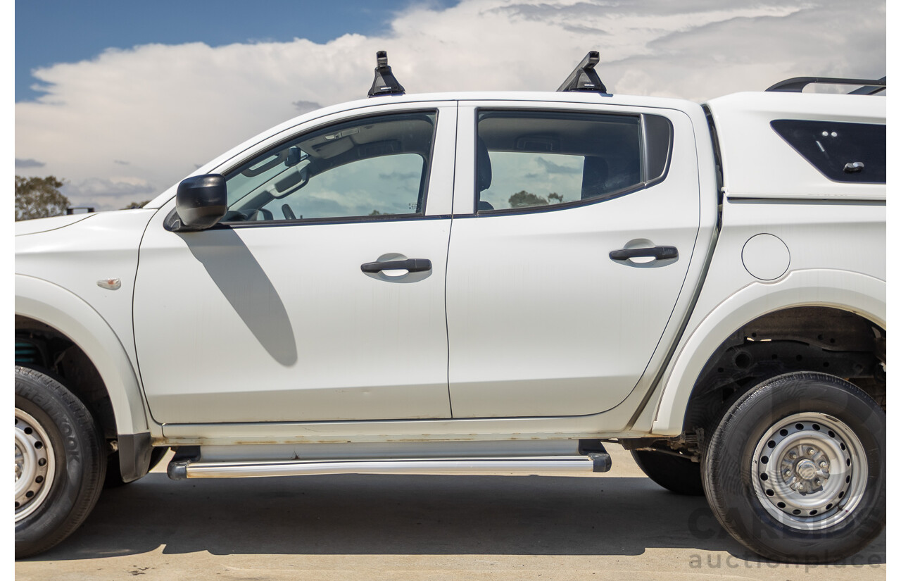 10/2016 Mitsubishi Triton GLX (4x4) MQ MY16 Dual Cab Utility Solid White Turbo Diesel 2.4L