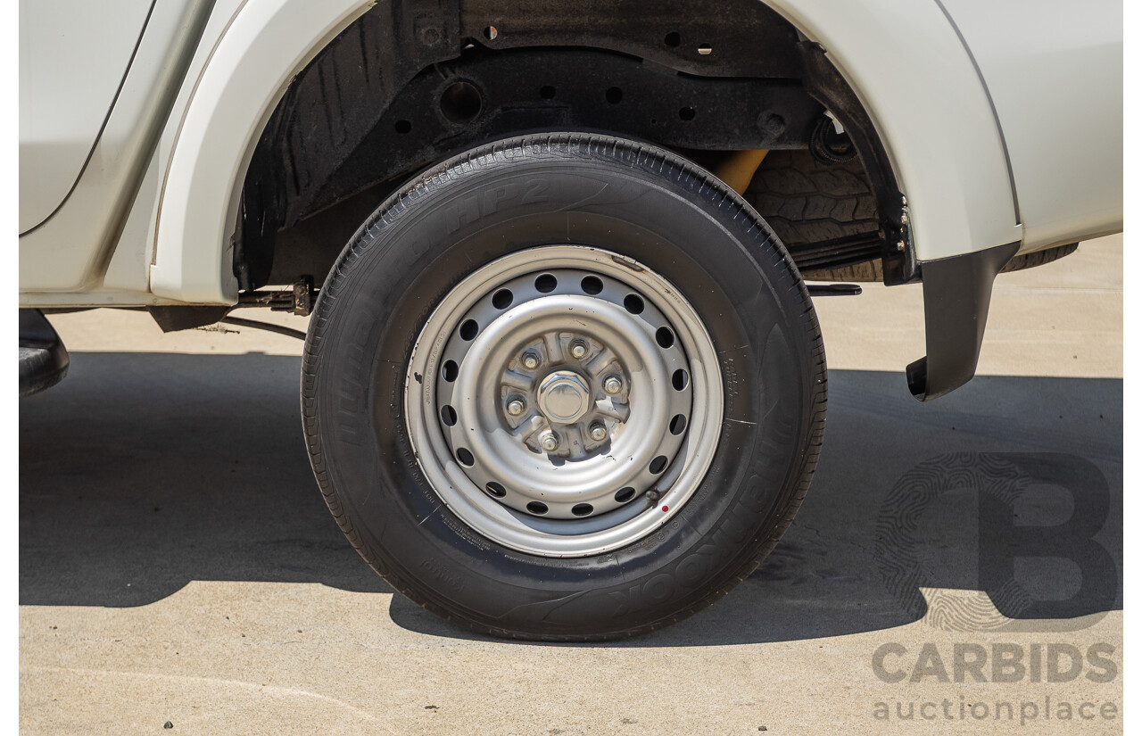 10/2016 Mitsubishi Triton GLX (4x4) MQ MY16 Dual Cab Utility Solid White Turbo Diesel 2.4L