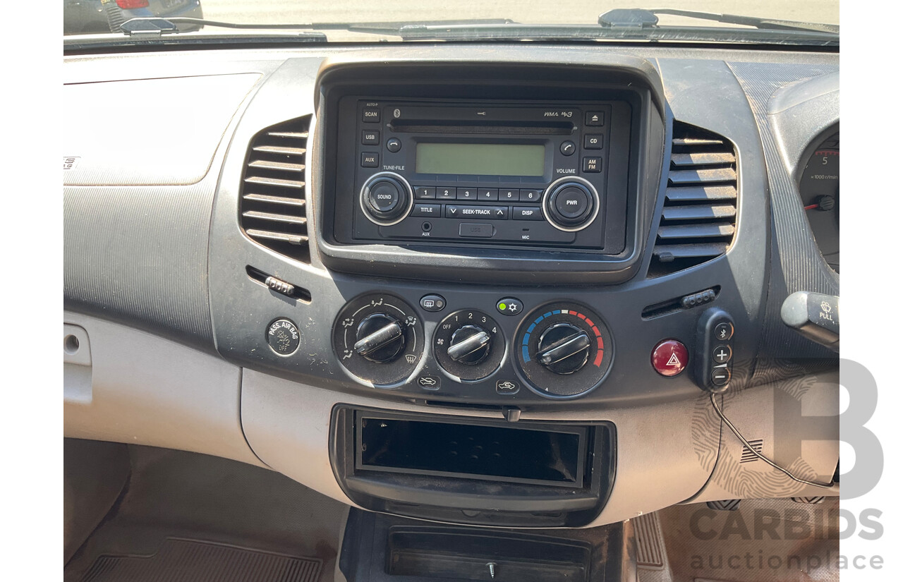 1/2012 Mitsubishi Triton GLX (4x4) MN MY12 Double Cab Utility Solid White Diesel Turbo 2.5L