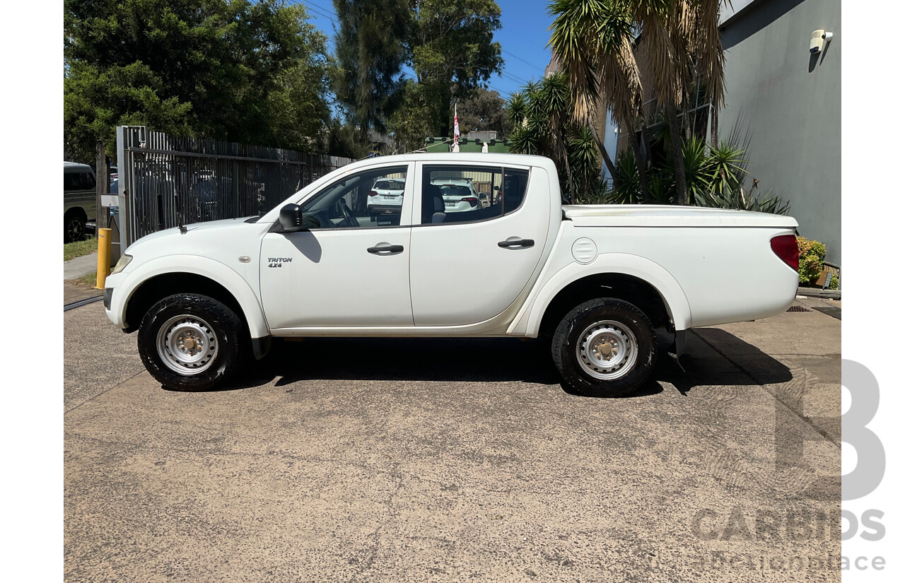 1/2012 Mitsubishi Triton GLX (4x4) MN MY12 Double Cab Utility Solid White Diesel Turbo 2.5L