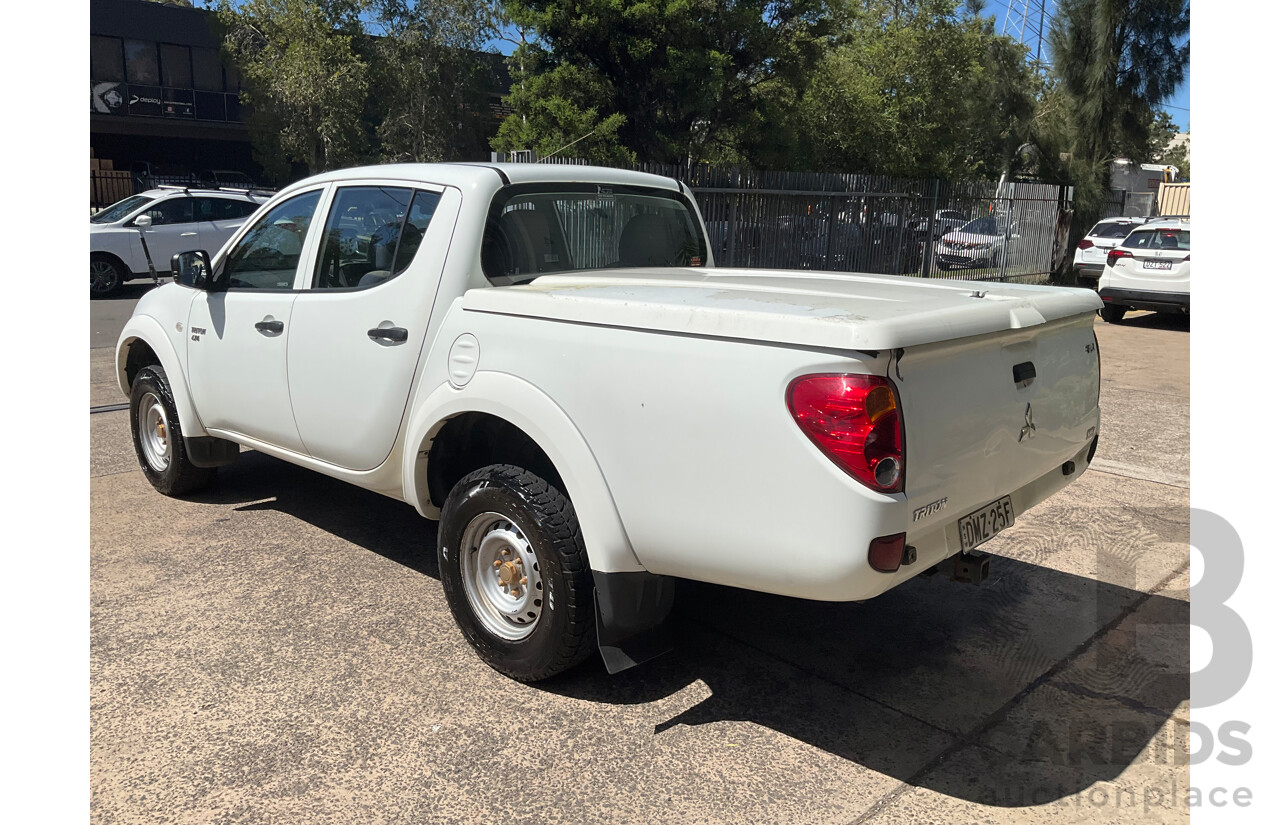 1/2012 Mitsubishi Triton GLX (4x4) MN MY12 Double Cab Utility Solid White Diesel Turbo 2.5L