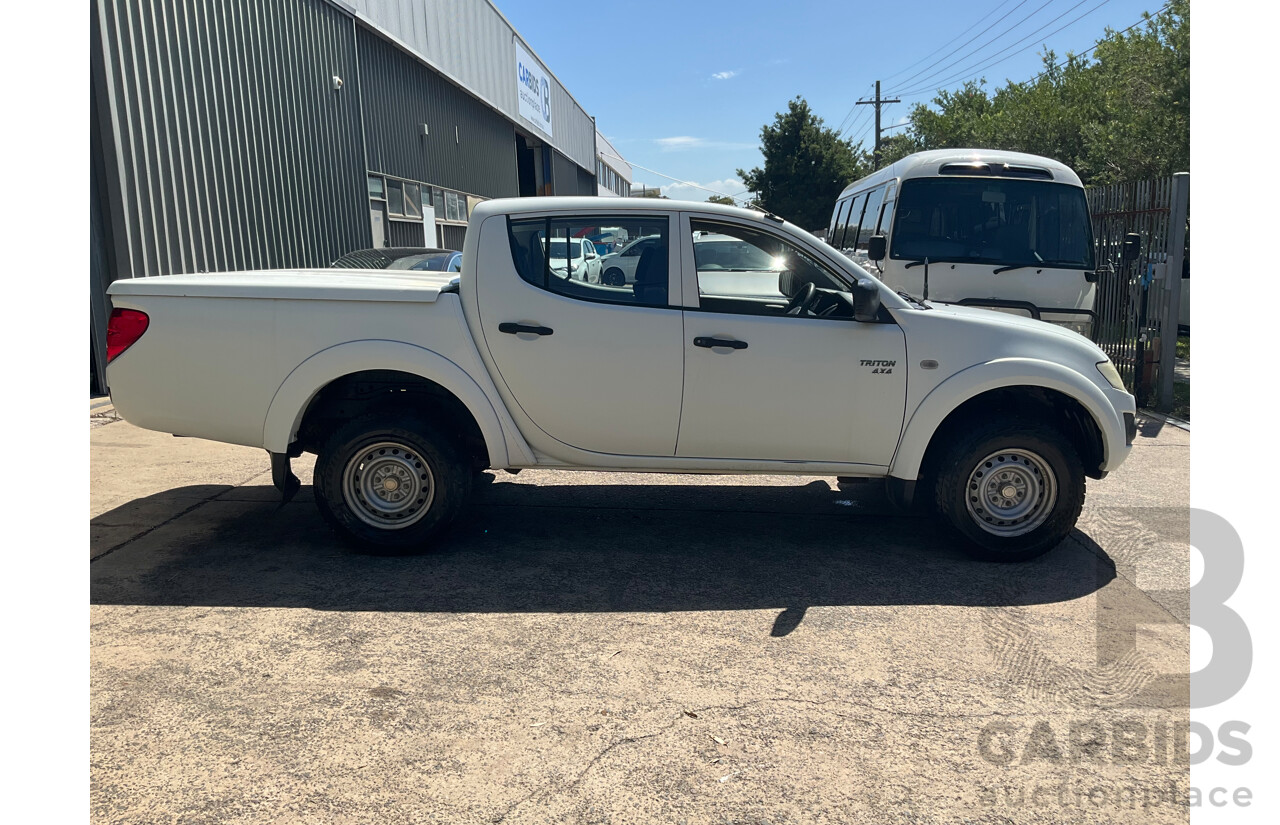 1/2012 Mitsubishi Triton GLX (4x4) MN MY12 Double Cab Utility Solid White Diesel Turbo 2.5L