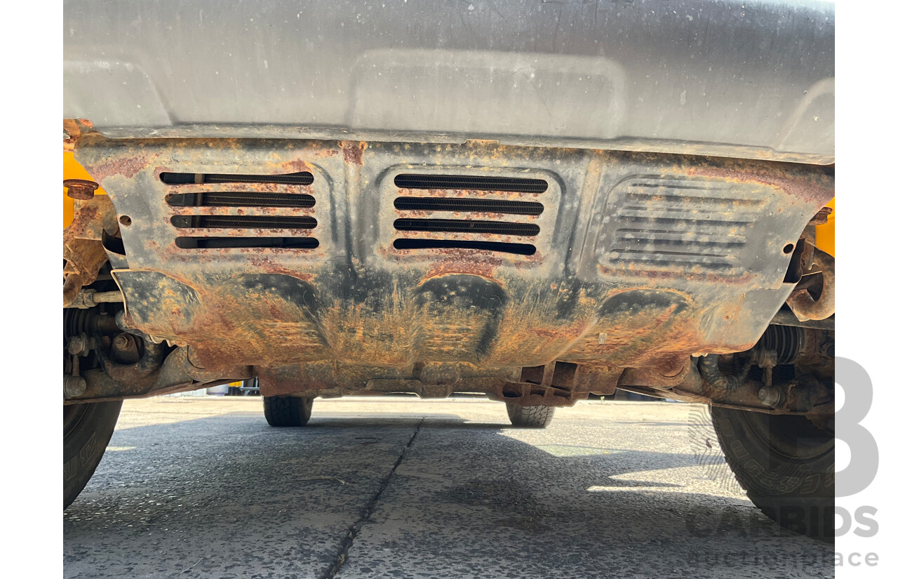 1/2012 Mitsubishi Triton GLX (4x4) MN MY12 Double Cab Utility Solid White Diesel Turbo 2.5L