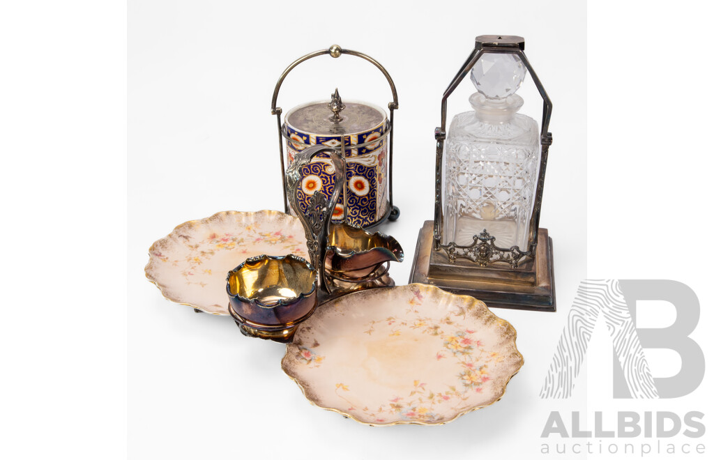 Collection of Three EPNS Tableware Pieces Inc Tantalus, Biscuit Barrel and Cruet Set.