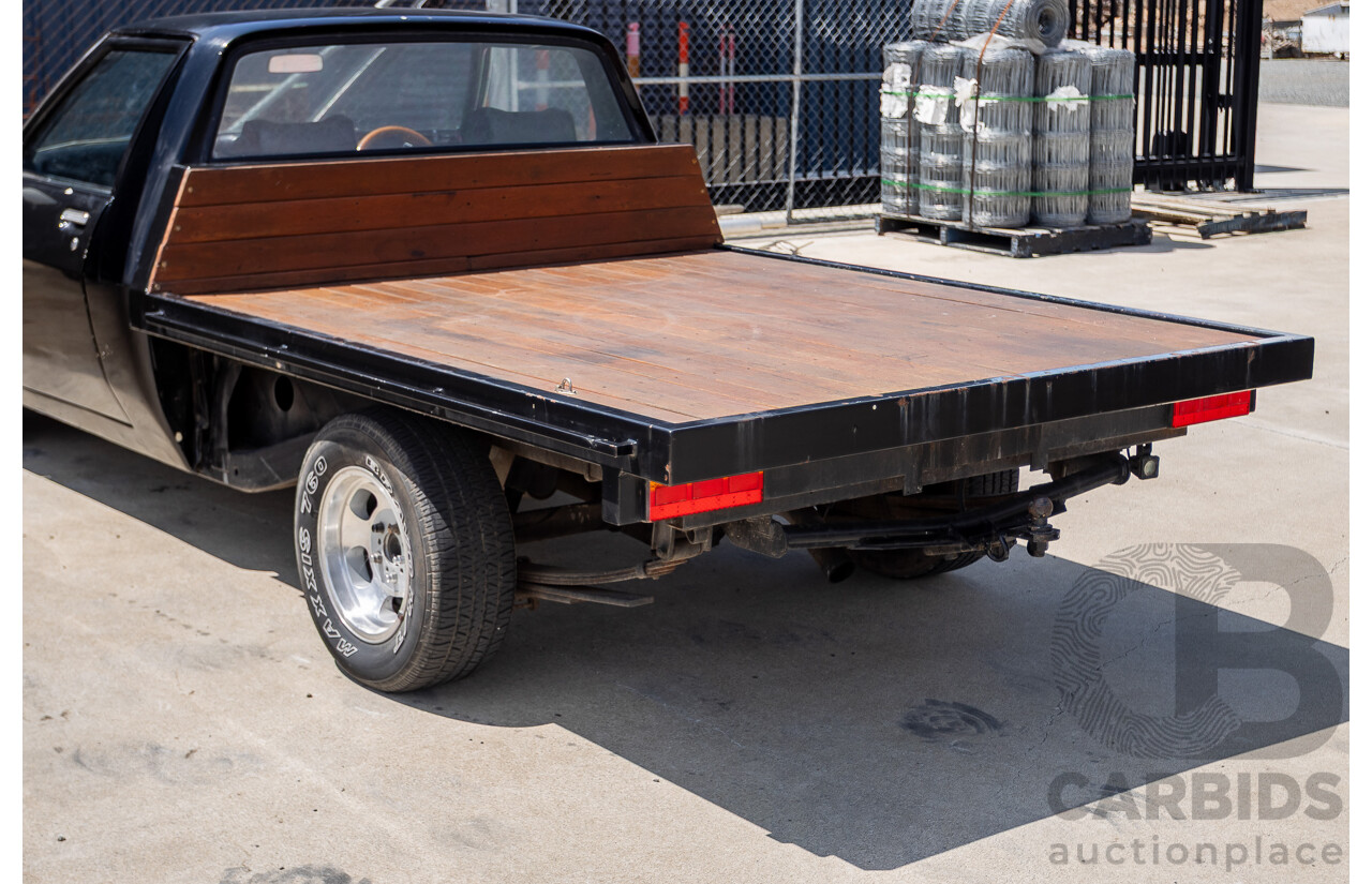 6/1981 Holden WB One Tonner 2d Trayback Utility Black V8 4.2L