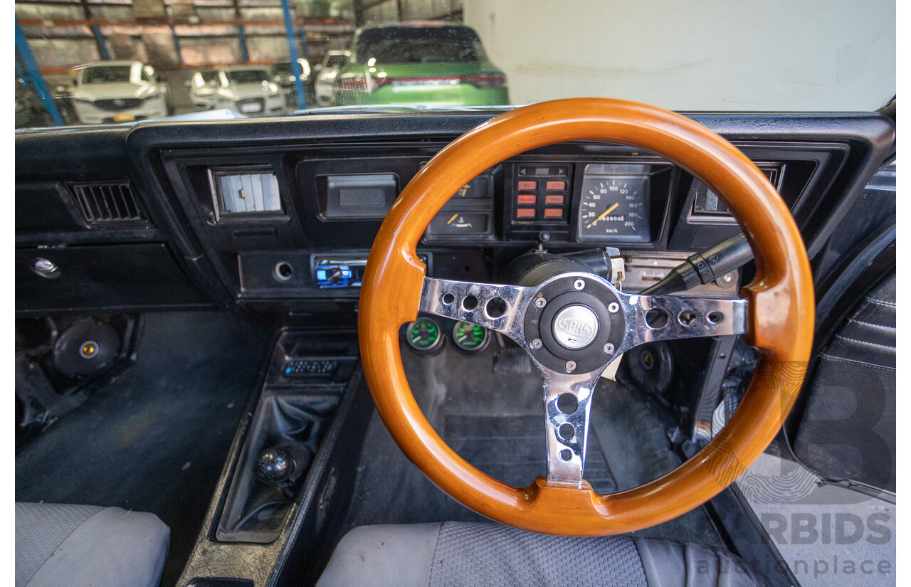 6/1981 Holden WB One Tonner 2d Trayback Utility Black V8 4.2L