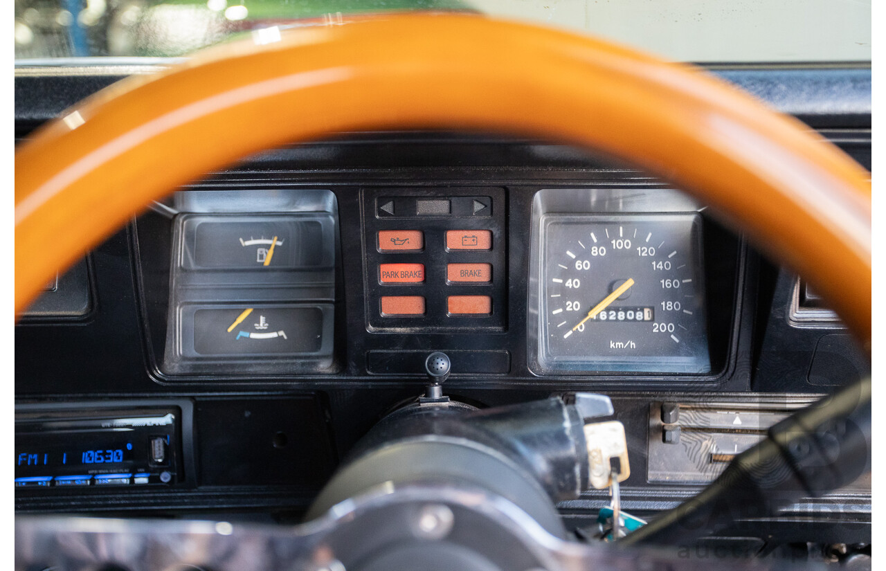 6/1981 Holden WB One Tonner 2d Trayback Utility Black V8 4.2L