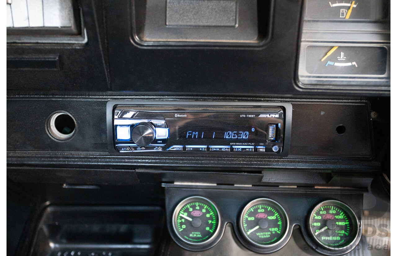 6/1981 Holden WB One Tonner 2d Trayback Utility Black V8 4.2L