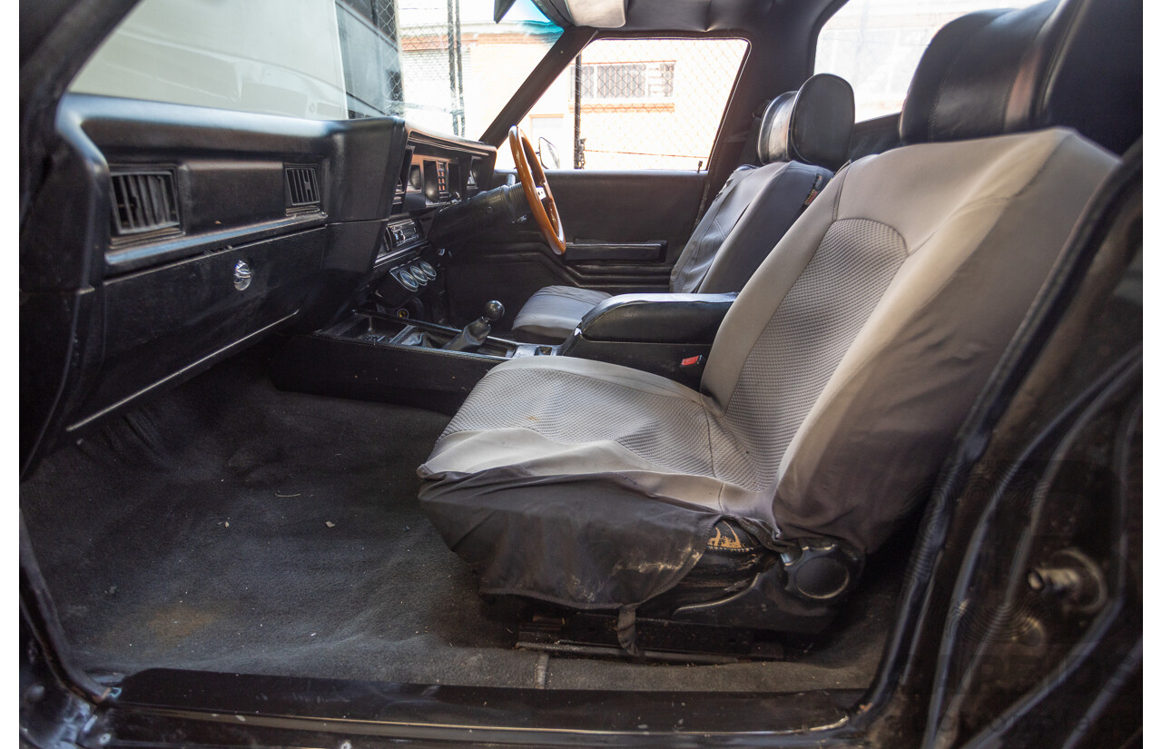 6/1981 Holden WB One Tonner 2d Trayback Utility Black V8 4.2L