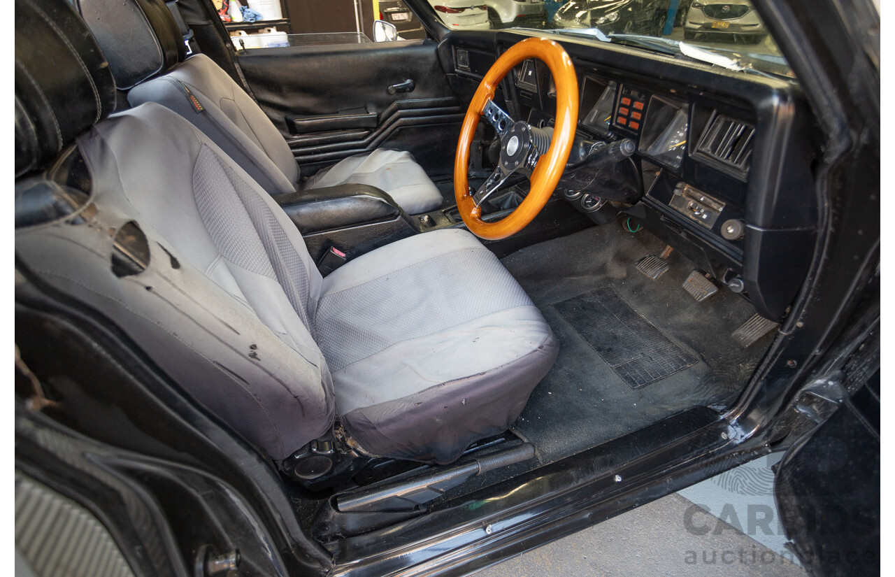 6/1981 Holden WB One Tonner 2d Trayback Utility Black V8 4.2L