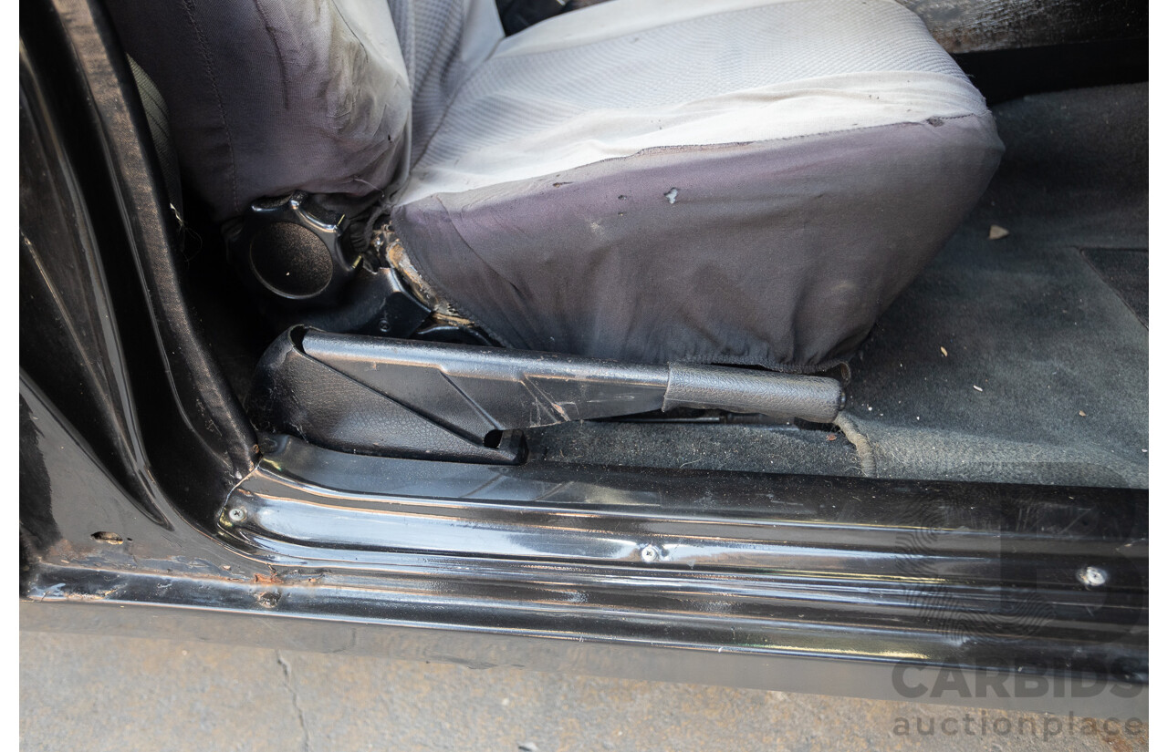 6/1981 Holden WB One Tonner 2d Trayback Utility Black V8 4.2L