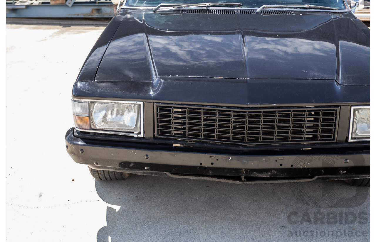6/1981 Holden WB One Tonner 2d Trayback Utility Black V8 4.2L