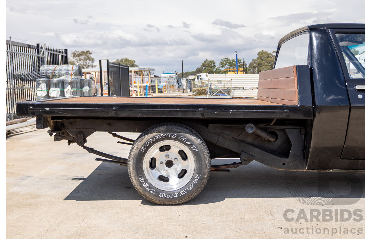 6/1981 Holden WB One Tonner 2d Trayback Utility Black V8 4.2L