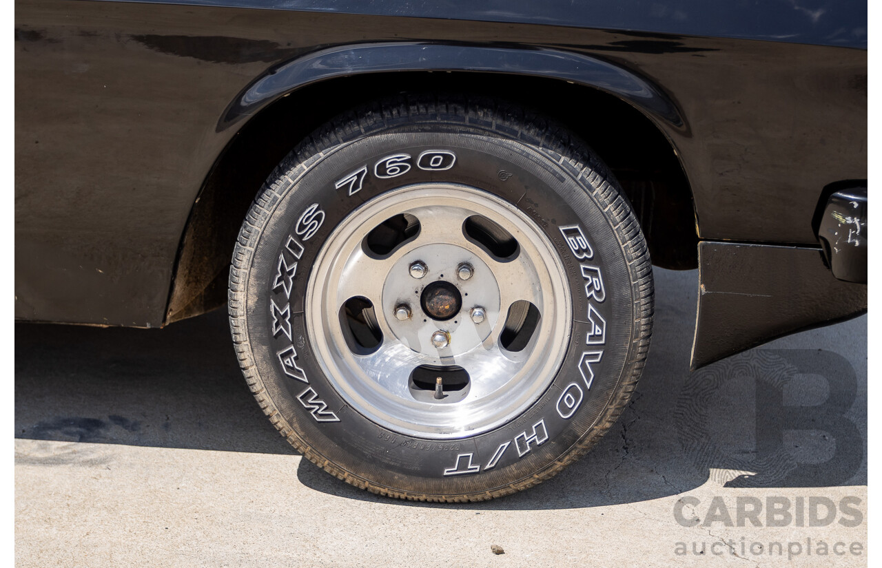 6/1981 Holden WB One Tonner 2d Trayback Utility Black V8 4.2L