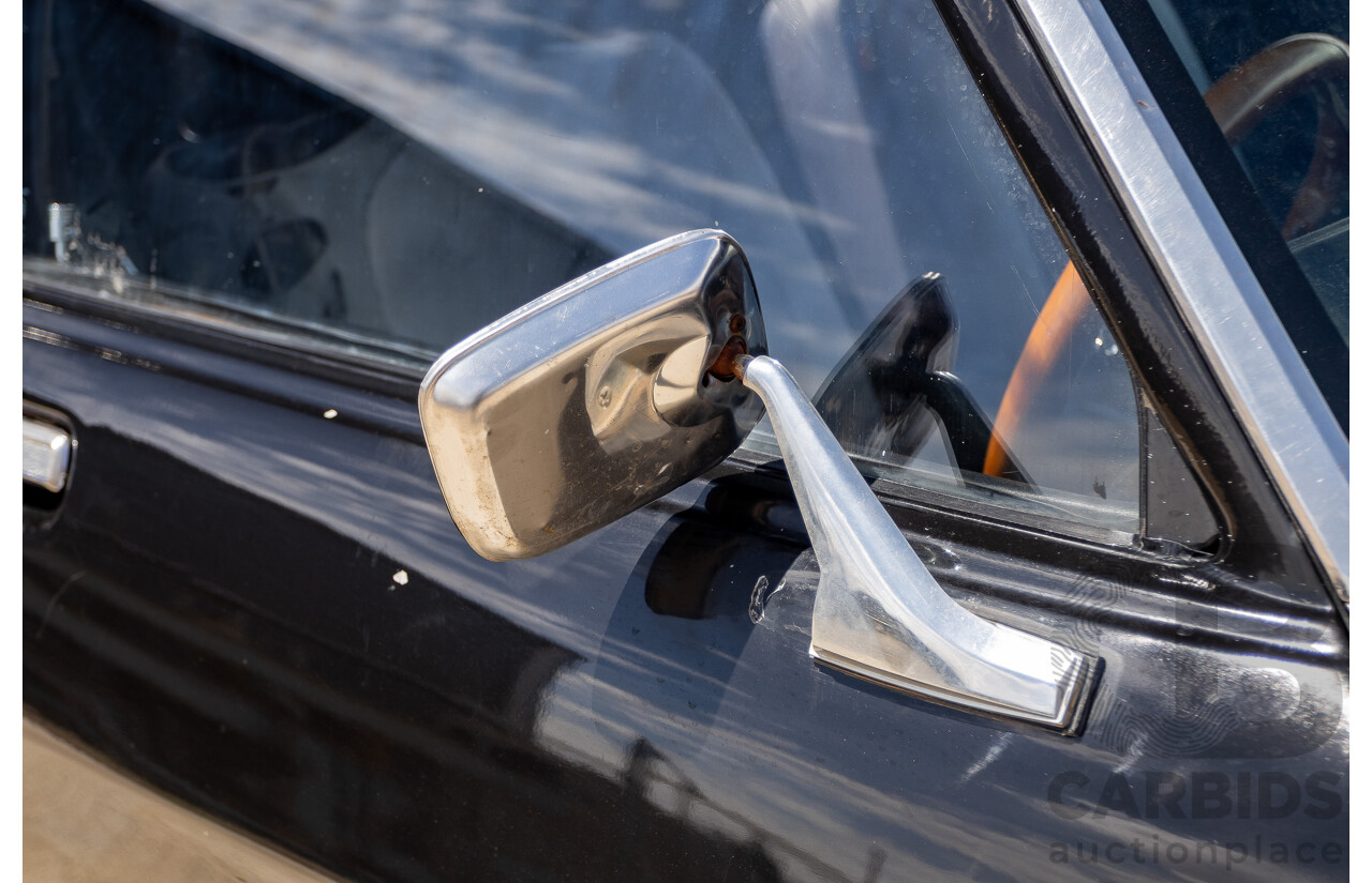 6/1981 Holden WB One Tonner 2d Trayback Utility Black V8 4.2L