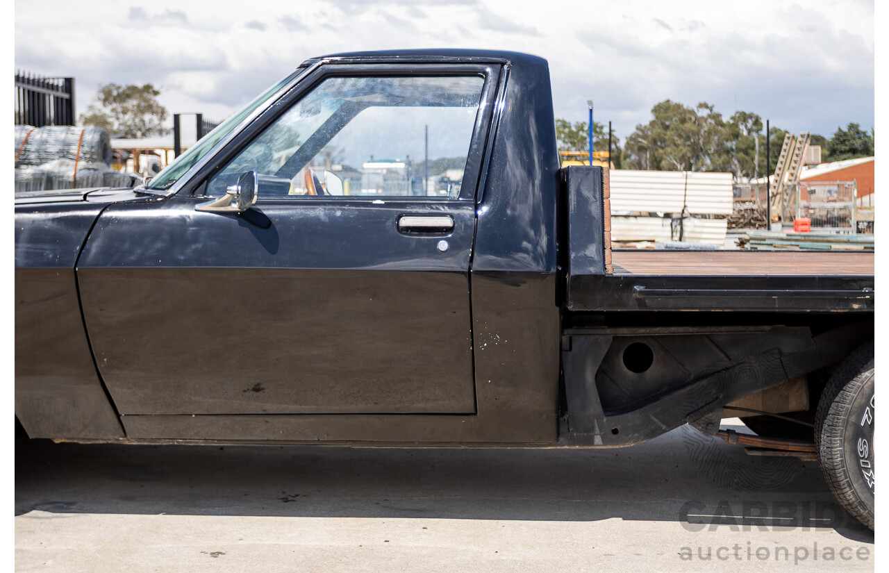 6/1981 Holden WB One Tonner 2d Trayback Utility Black V8 4.2L