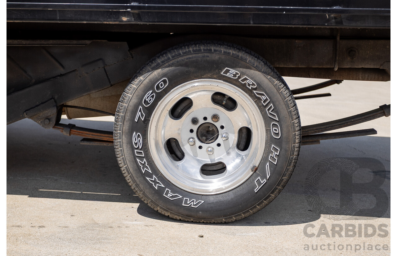 6/1981 Holden WB One Tonner 2d Trayback Utility Black V8 4.2L