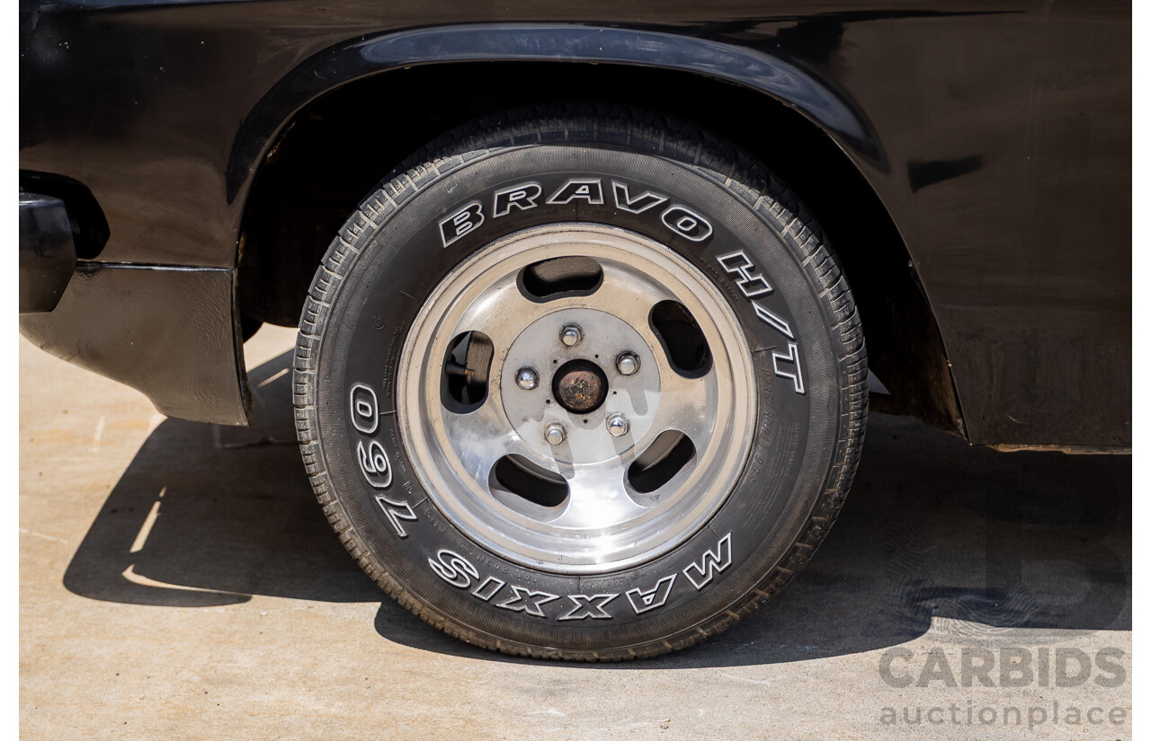 6/1981 Holden WB One Tonner 2d Trayback Utility Black V8 4.2L