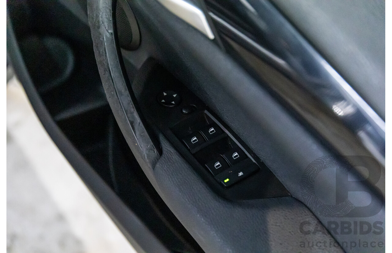 11/2011 BMW X1 xDrive20d E84 MY11 4d Wagon Titanium Silver Metallic Turbo Diesel 2.0L