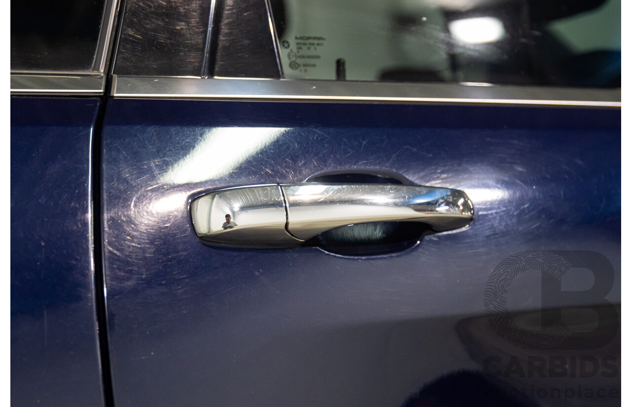 6/2013 Jeep Grand Cherokee Overland (4x4) WK MY14 4d Wagon True Blue Metallic V6 3.6L