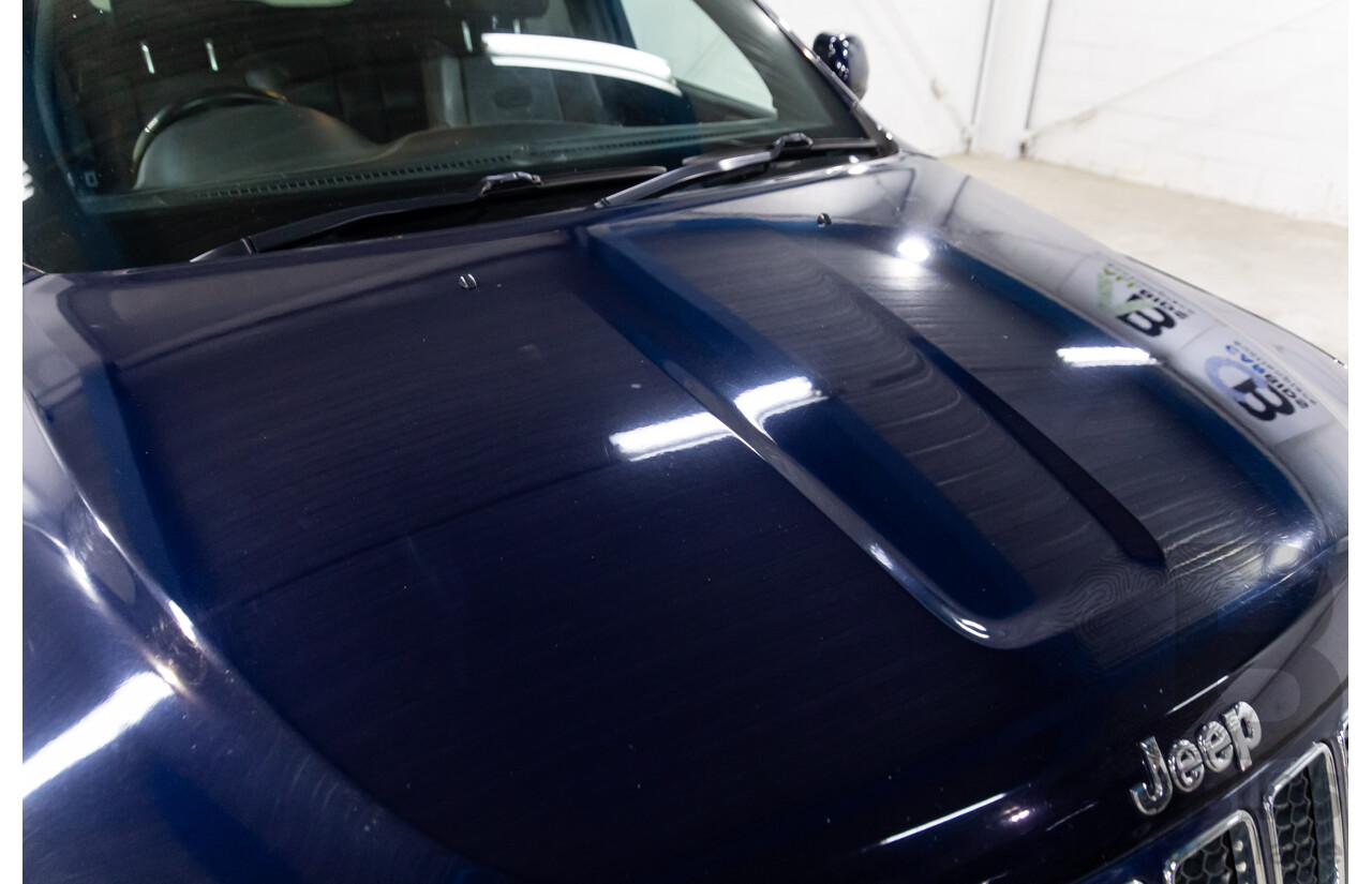 6/2013 Jeep Grand Cherokee Overland (4x4) WK MY14 4d Wagon True Blue Metallic V6 3.6L