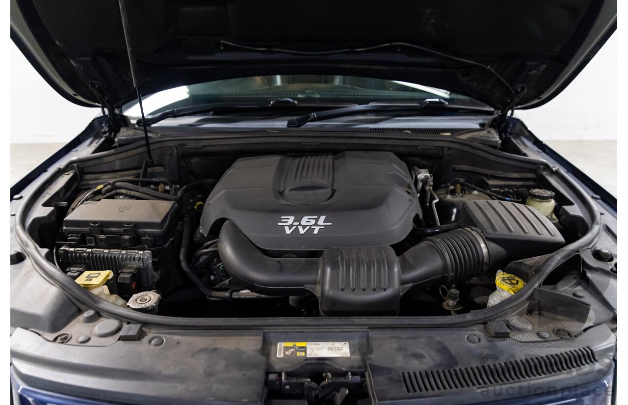 6/2013 Jeep Grand Cherokee Overland (4x4) WK MY14 4d Wagon True Blue Metallic V6 3.6L