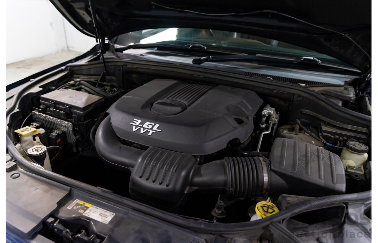 6/2013 Jeep Grand Cherokee Overland (4x4) WK MY14 4d Wagon True Blue Metallic V6 3.6L