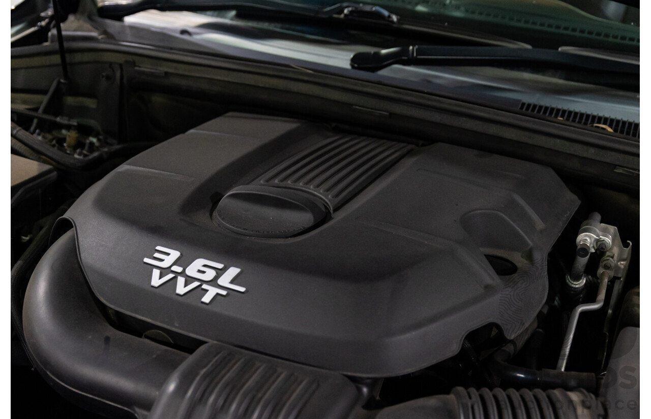 6/2013 Jeep Grand Cherokee Overland (4x4) WK MY14 4d Wagon True Blue Metallic V6 3.6L