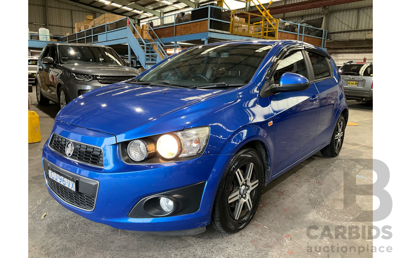 10/2014 Holden Barina CD TM MY14 4d Sedan Boracay Blue Metallic 1.6L