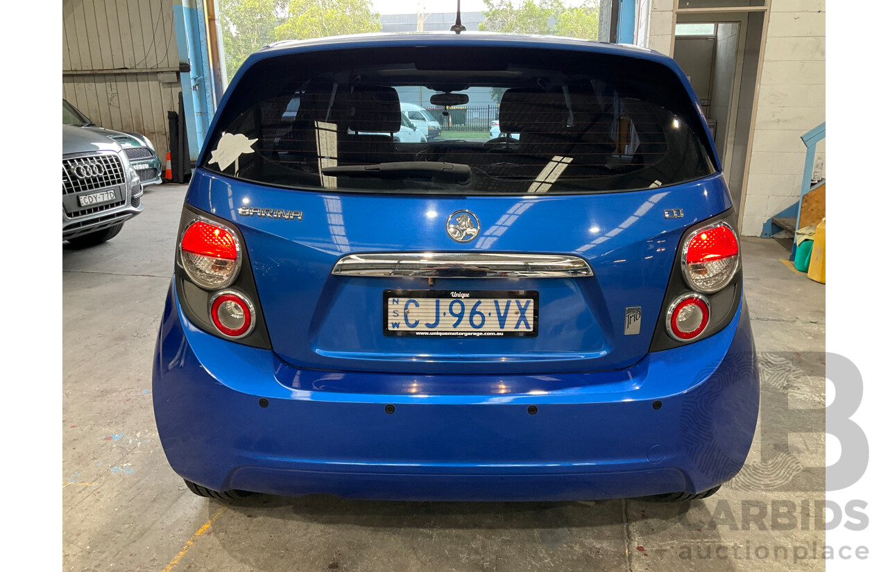 10/2014 Holden Barina CD TM MY14 4d Sedan Boracay Blue Metallic 1.6L
