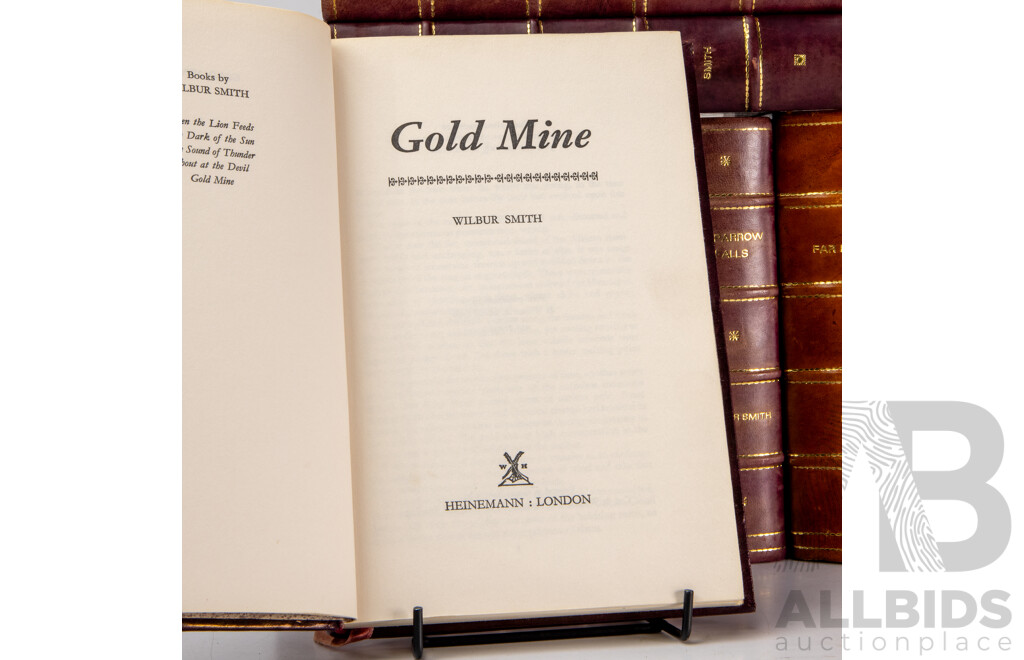 Collection of 11 Leather Bound Novels by Wilbur Smith and M.M Kaye