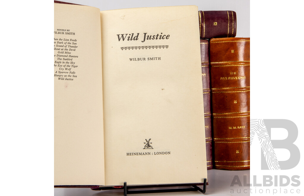 Collection of 11 Leather Bound Novels by Wilbur Smith and M.M Kaye