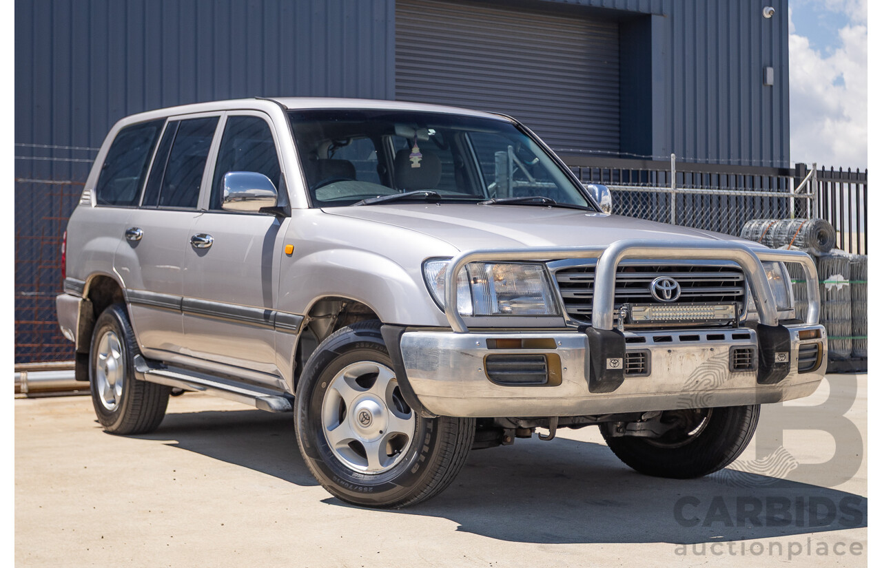 10/2002 Toyota Landcruiser GXL (4x4) FZJ105R 4D Warm Silver Metallic V8 4.7L - 8 Seater
