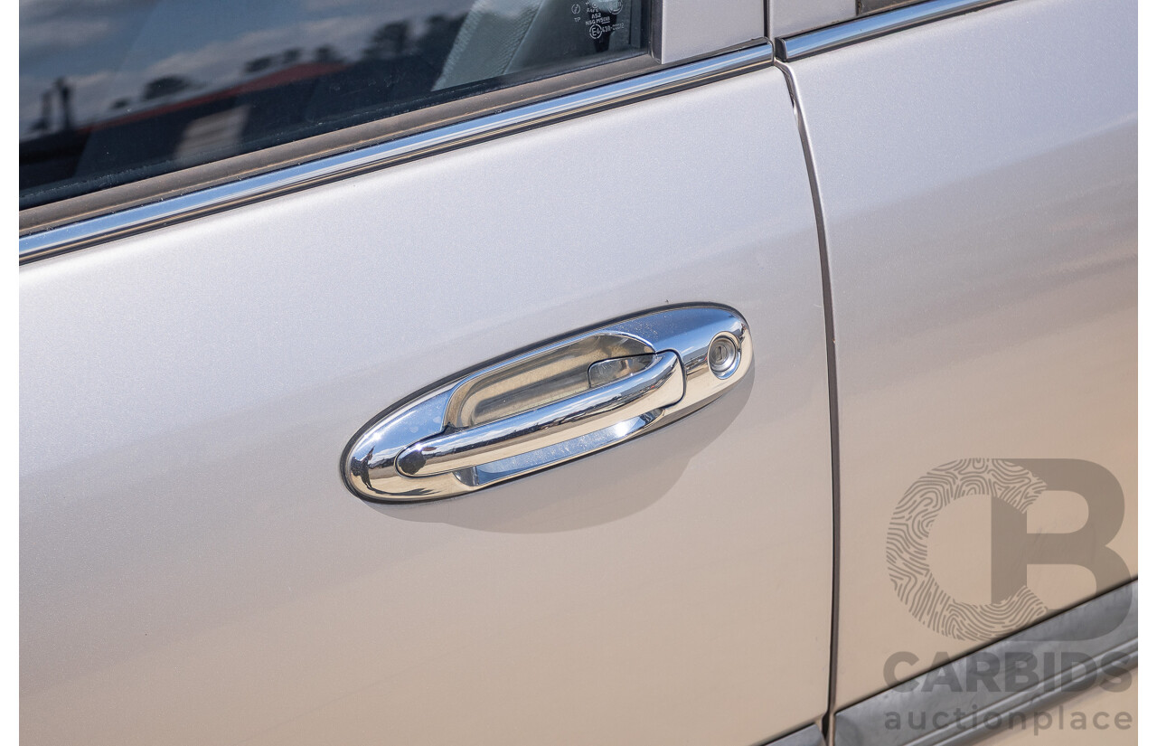 10/2002 Toyota Landcruiser GXL (4x4) FZJ105R 4D Warm Silver Metallic V8 4.7L - 8 Seater