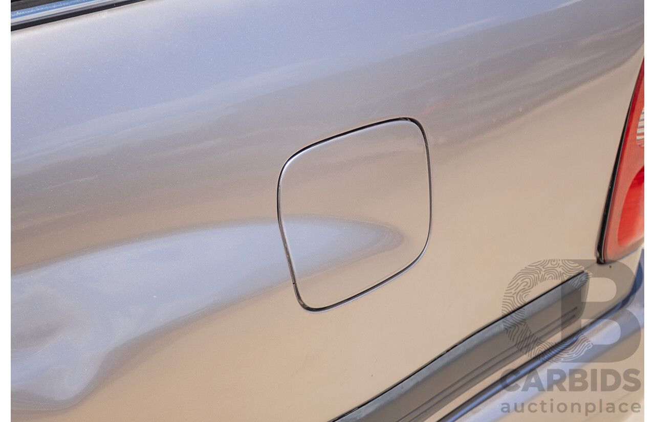 10/2002 Toyota Landcruiser GXL (4x4) FZJ105R 4D Warm Silver Metallic V8 4.7L - 8 Seater