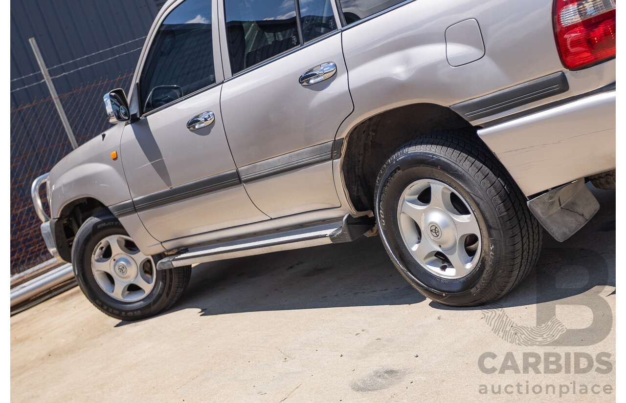 10/2002 Toyota Landcruiser GXL (4x4) FZJ105R 4D Warm Silver Metallic V8 4.7L - 8 Seater