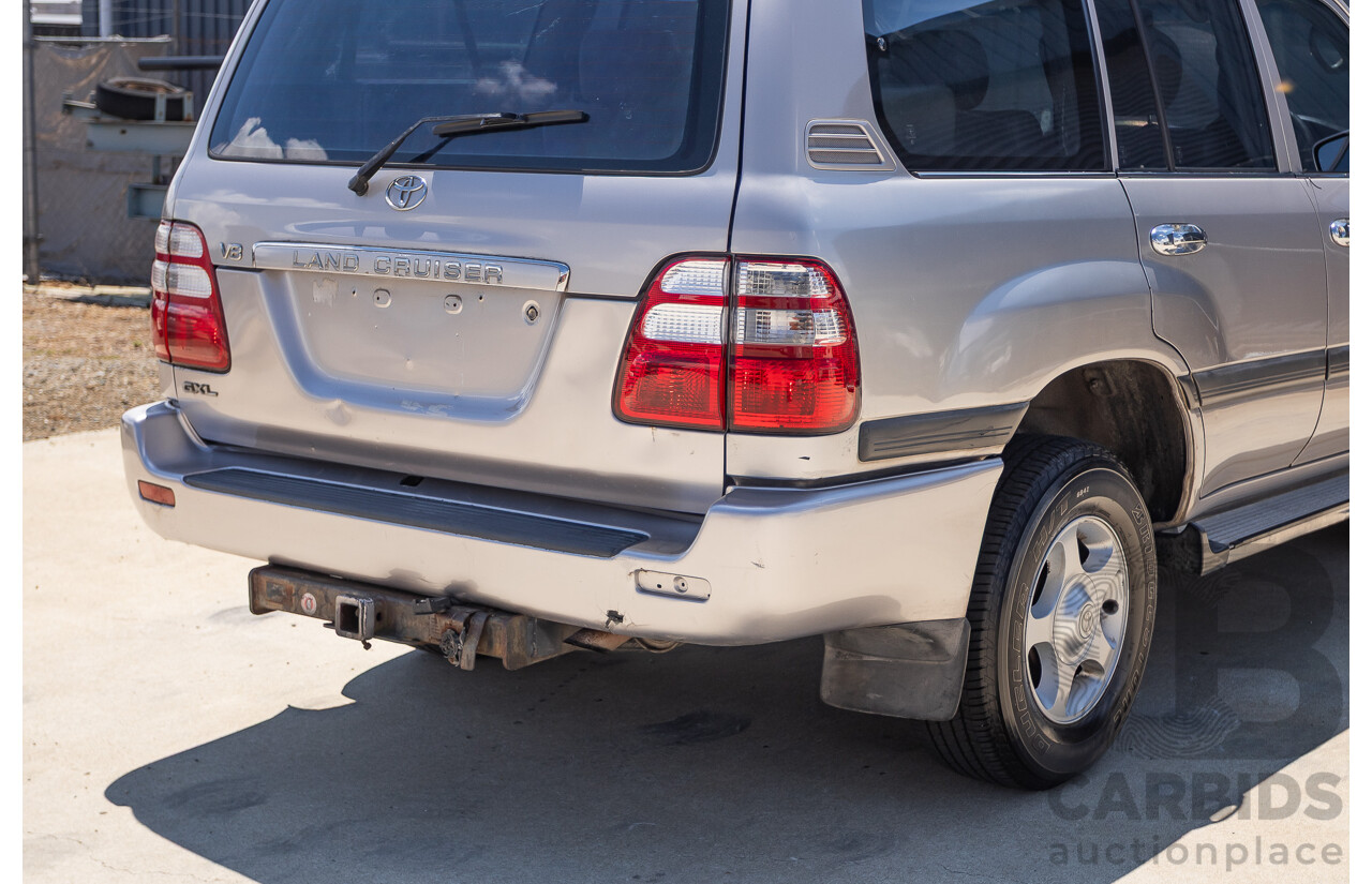 10/2002 Toyota Landcruiser GXL (4x4) FZJ105R 4D Warm Silver Metallic V8 4.7L - 8 Seater