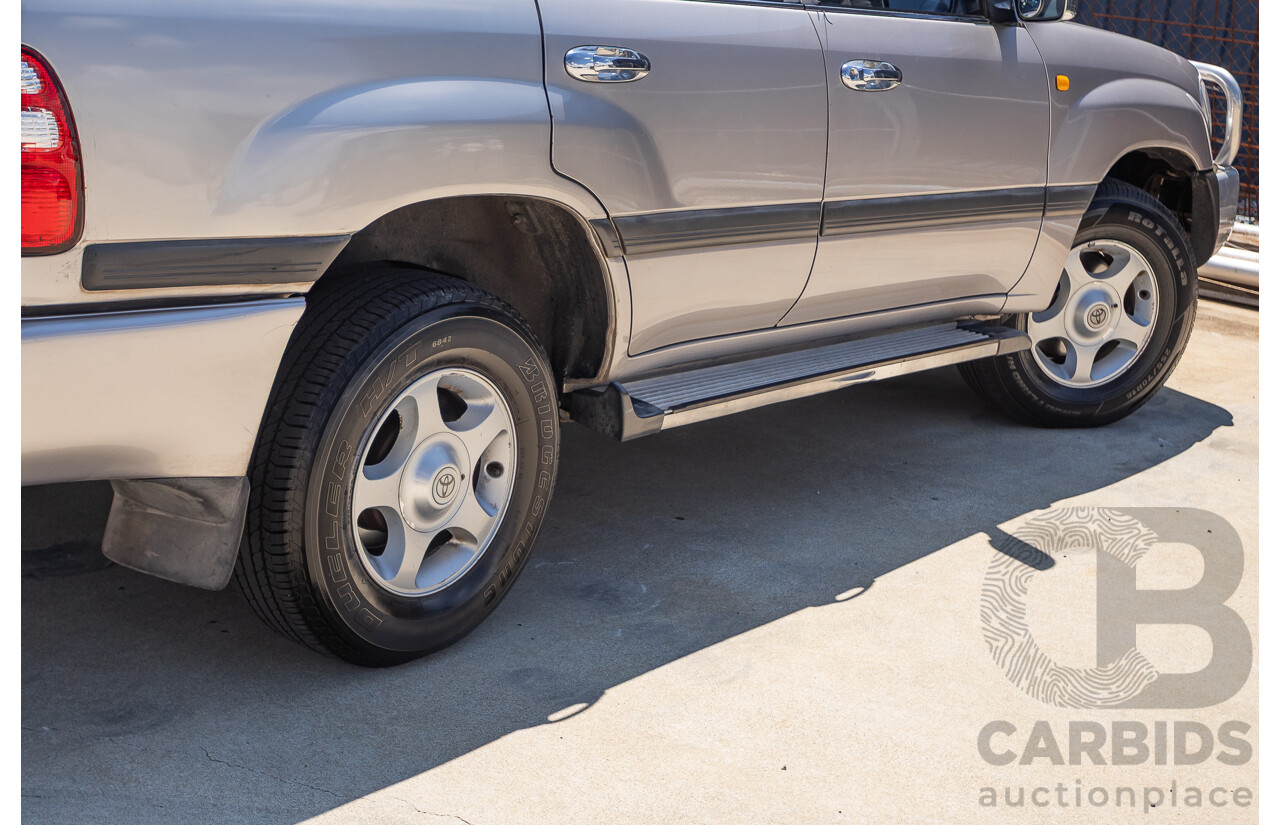 10/2002 Toyota Landcruiser GXL (4x4) FZJ105R 4D Warm Silver Metallic V8 4.7L - 8 Seater