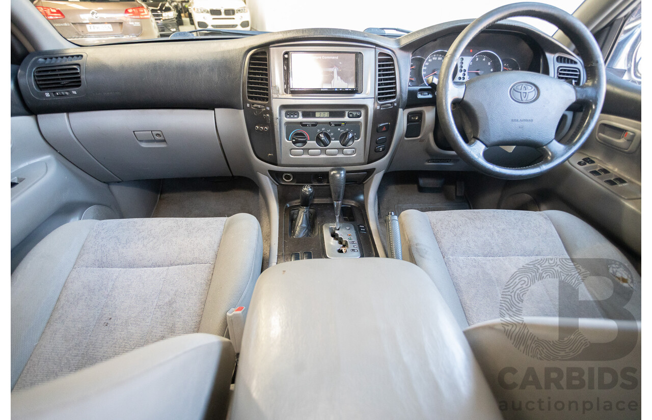10/2002 Toyota Landcruiser GXL (4x4) FZJ105R 4D Warm Silver Metallic V8 4.7L - 8 Seater