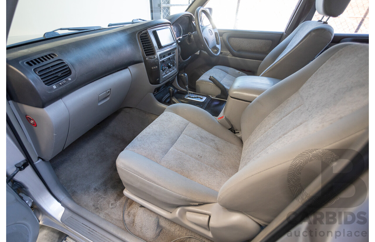 10/2002 Toyota Landcruiser GXL (4x4) FZJ105R 4D Warm Silver Metallic V8 4.7L - 8 Seater