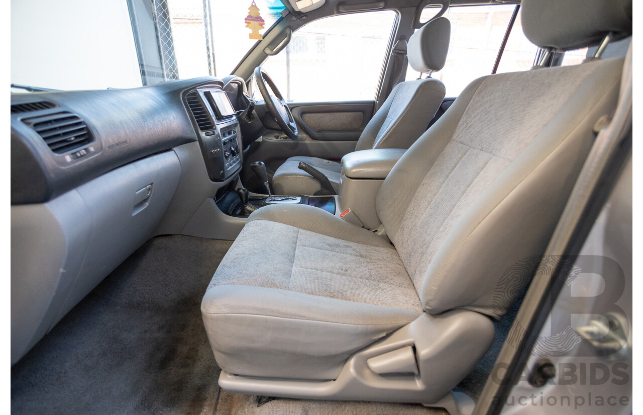 10/2002 Toyota Landcruiser GXL (4x4) FZJ105R 4D Warm Silver Metallic V8 4.7L - 8 Seater