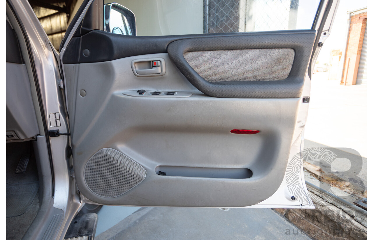 10/2002 Toyota Landcruiser GXL (4x4) FZJ105R 4D Warm Silver Metallic V8 4.7L - 8 Seater