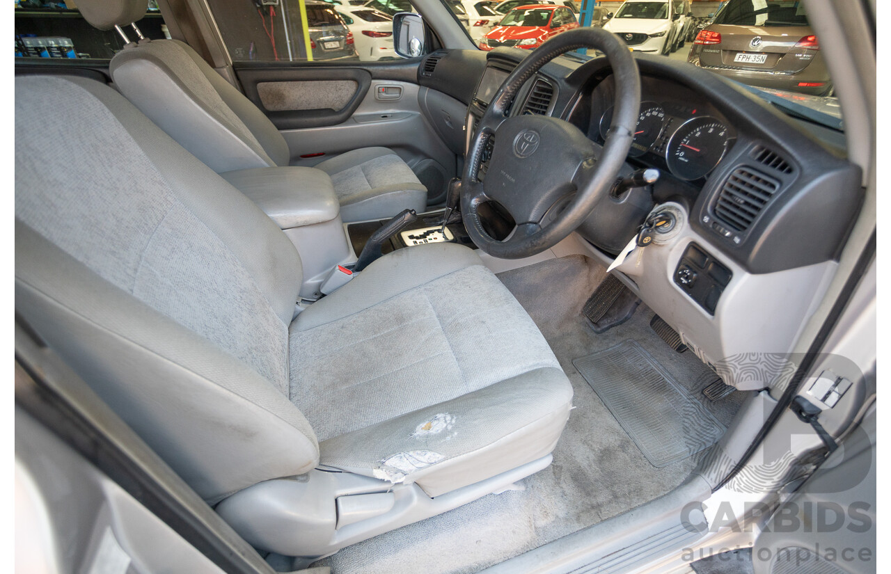 10/2002 Toyota Landcruiser GXL (4x4) FZJ105R 4D Warm Silver Metallic V8 4.7L - 8 Seater