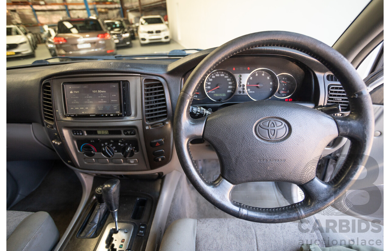 10/2002 Toyota Landcruiser GXL (4x4) FZJ105R 4D Warm Silver Metallic V8 4.7L - 8 Seater