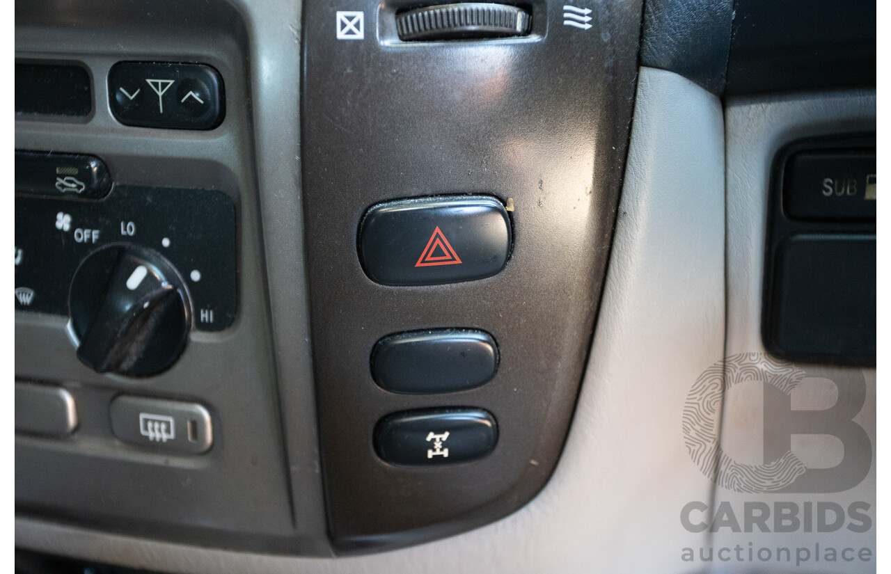 10/2002 Toyota Landcruiser GXL (4x4) FZJ105R 4D Warm Silver Metallic V8 4.7L - 8 Seater