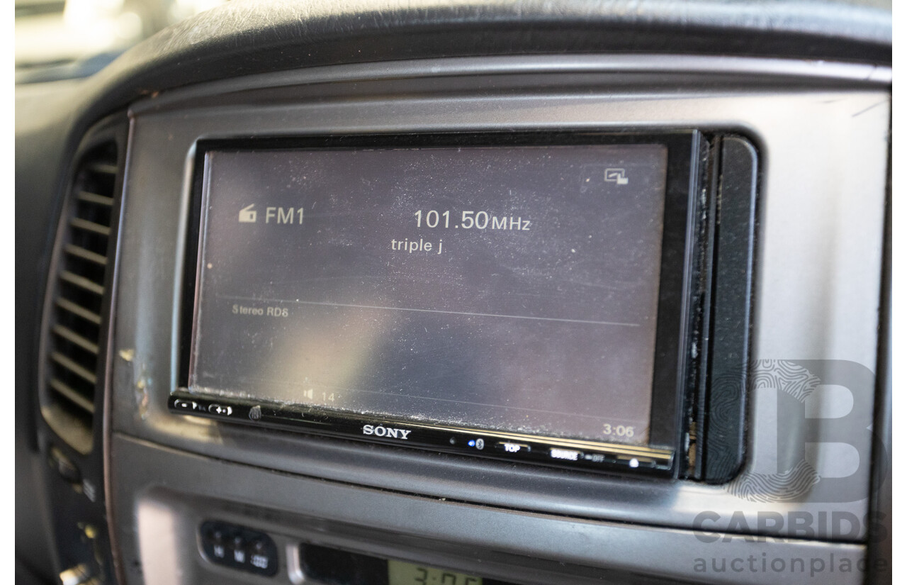 10/2002 Toyota Landcruiser GXL (4x4) FZJ105R 4D Warm Silver Metallic V8 4.7L - 8 Seater