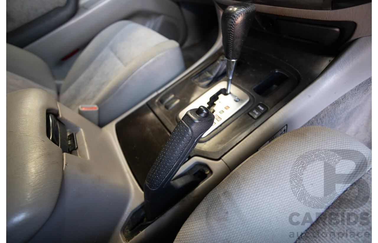 10/2002 Toyota Landcruiser GXL (4x4) FZJ105R 4D Warm Silver Metallic V8 4.7L - 8 Seater